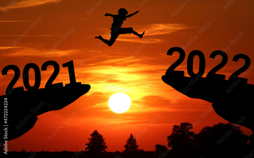 happy-new-year-2022-concept-silhouette-2022-a-man-running-and-jumping