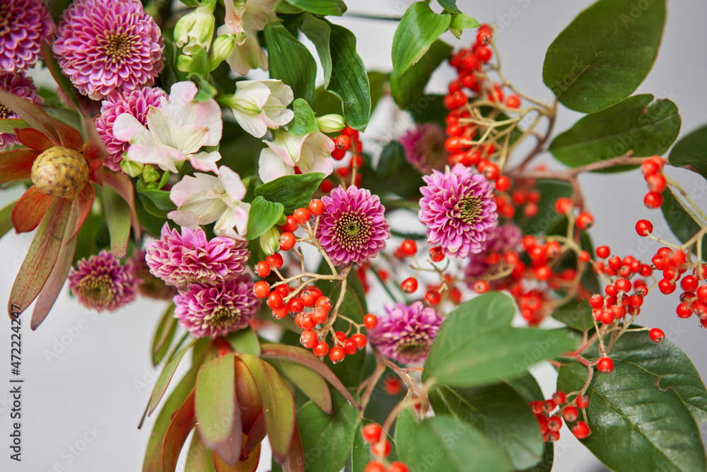 Finished flower arrangement in a vase for home. Flowers bunch, set for interior. Fresh cut flowers for decoration home. European floral shop. Delivery fresh cut flower.