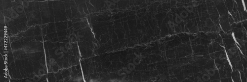 Black marble natural pattern for background, exotic abstract limestone marbel rustic matt  ceramic wall and floor tiles, Emperador polished slice mineral of granite stone, Italian rustic quartzite © Michael Benjamin