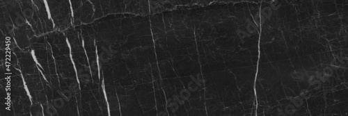 Dark grey black slate marble background or marbel texture, natural black rustic matt marble , glossy marbel stone texture for digital wall tiles and floor tiles, black granite tiles of Quartz crystal.