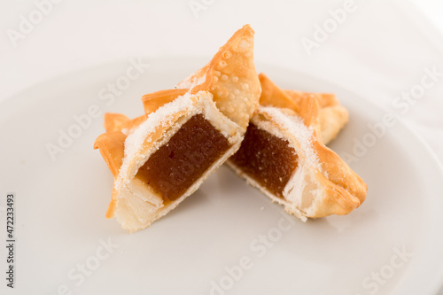 pastelitos fritos rellenos con dulce de membrillo photo