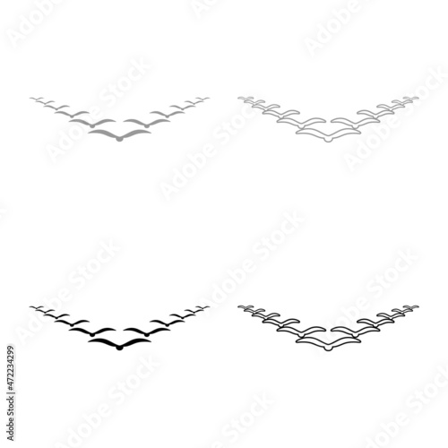 Canvas Print Flock of birds flying in the sky in wedge key Leadership concept Migration silho