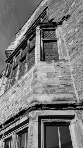 English medievil Castle with leaded windows in monochrome 