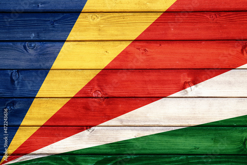Flag of Seychelles on wooden surface
