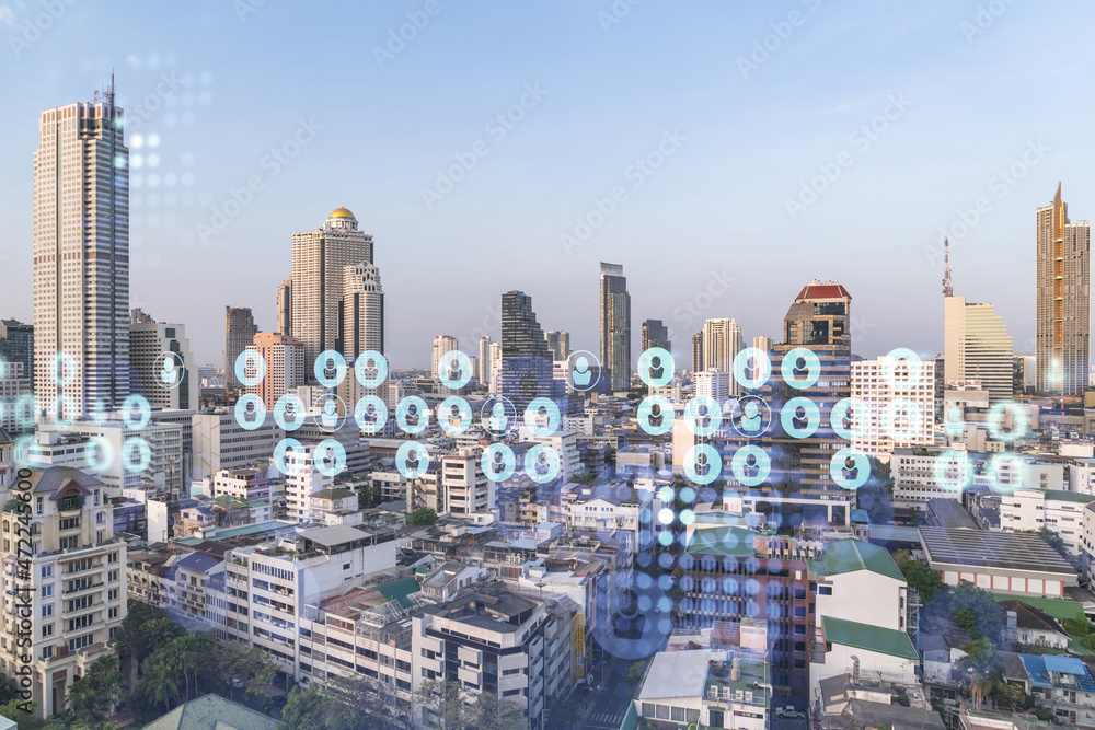 Obraz premium Social media icons hologram over panorama city view of Bangkok, Southeast Asia. The concept of people networking, connections and career opportunities. Double exposure.