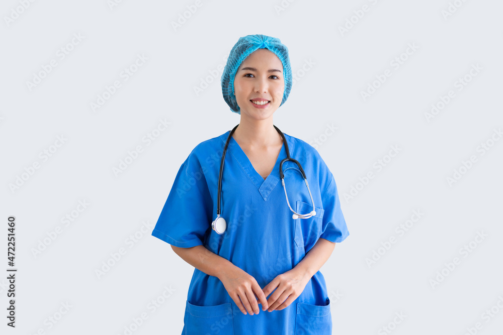 Asian female doctor smiling wearing surgical gown and hat blue isolated background