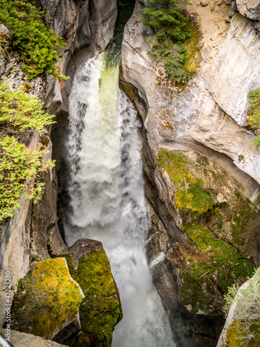 Waterfall of the Maligne River in the Maligne Canyon at First Bridge in Jasper National Park of the Rocky Mountains, Alberta, Canada