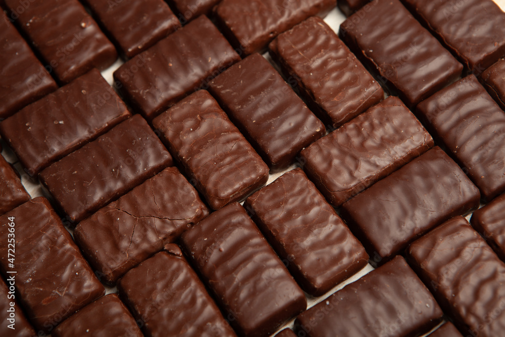 Festive Happy New Year's table full of chocolates. Assortment of delicious chocolate candies background Festive Happy New Year's table full of chocolates. Assortment of delicious chocolate candies background