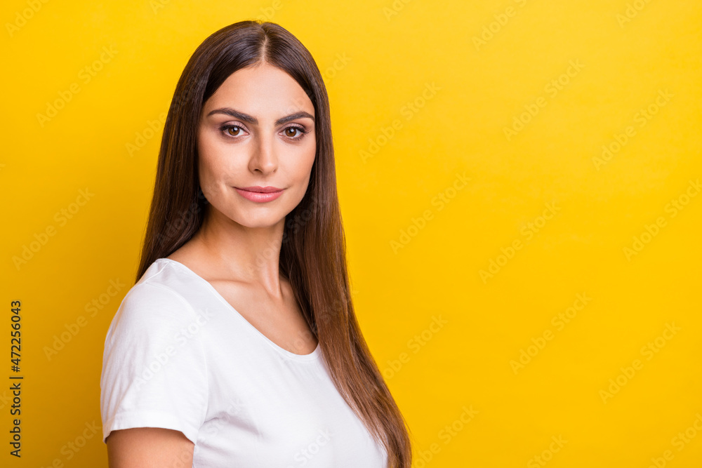 Photo portrait girl brown hair white t-shirt isolated vivid yellow color background copyspace Photo portrait girl brown hair white t-shirt isolated vivid yellow color background copyspace