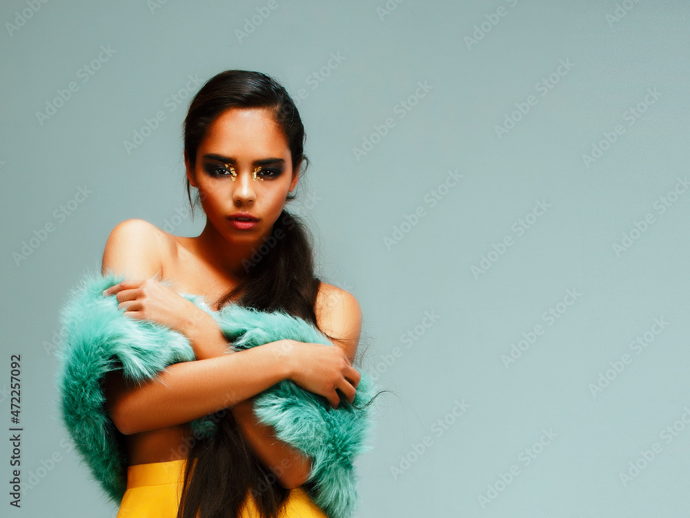 young pretty african-american woman posing in fashion clothers emotional, lifestyle people concept young pretty african-american woman posing in fashion clothers emotional, lifestyle people concept