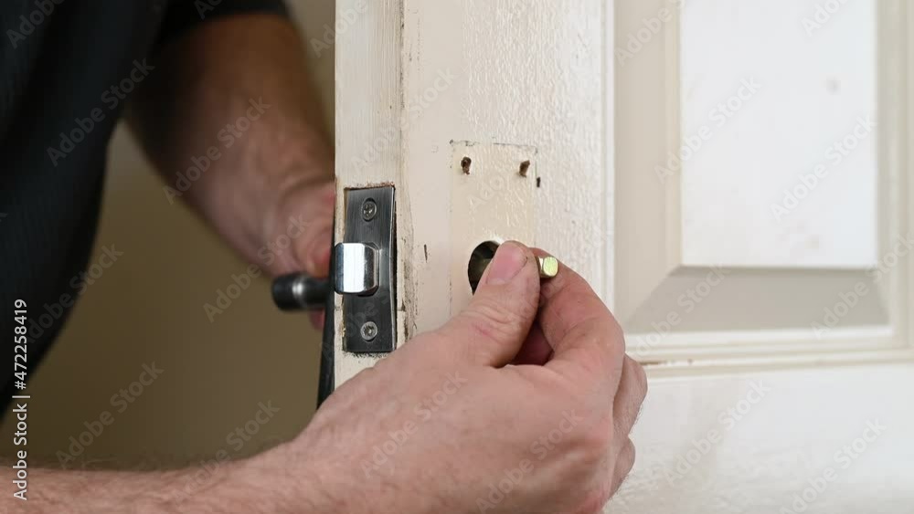 Adding new handles to spindle in door lock barrel Stock Video Adobe Stock