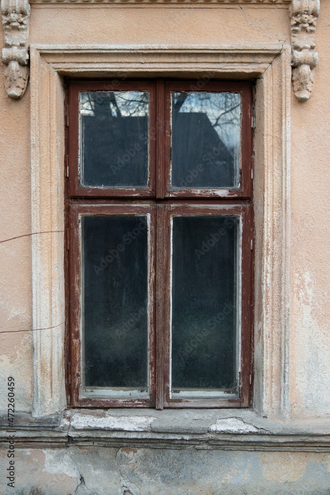 Old window in a wooden frame.