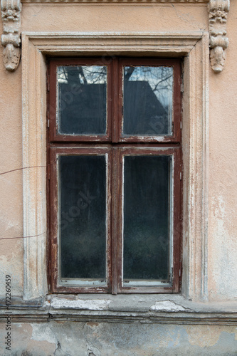 Old window in a wooden frame.