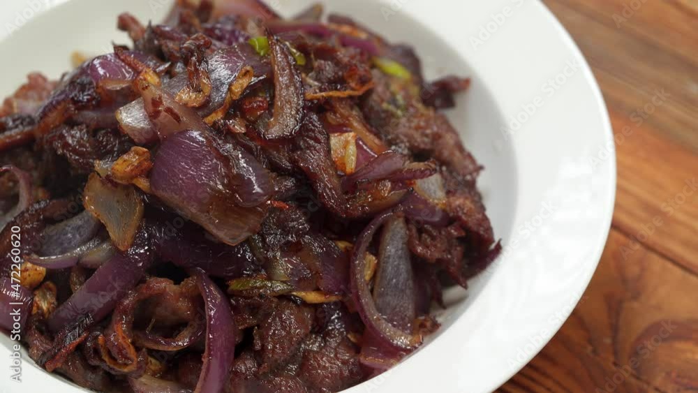 Chinese home-cooked side dishes, fried beef with onion Chinese home-cooked side dishes, fried beef with onion