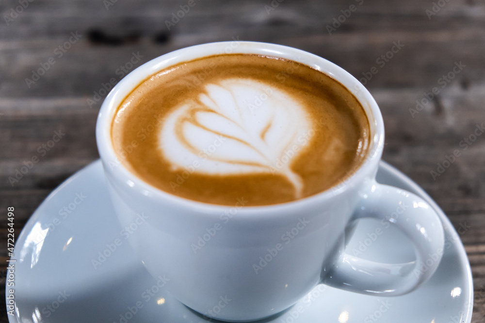 Close up of hot latte coffee in the cafe, latte art coffee. Close up of hot latte coffee in the cafe, latte art coffee.