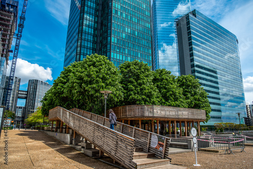 Photography Modern Installation of a path in the trees between skyscrapers in La Defense fin