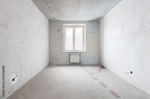 interior of the apartment without decoration in gray colors