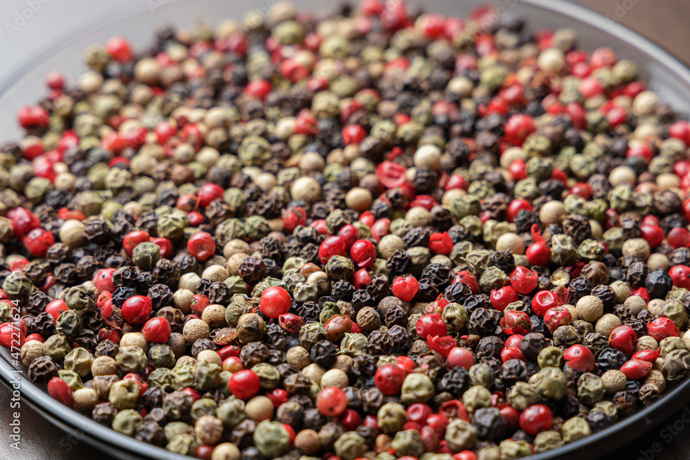 Pile of pepper seeds as background. Perspective view Pile of pepper seeds as background. Perspective view