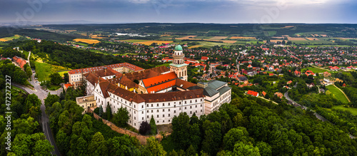 Pannonhalma, Hungary - Aerial panoramic view of the beautiful Millenary Benedictine Abbey of Pannonhalma (Pannonhalmi Apatsag) with clear bluet sky at summertime photo