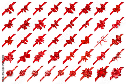 Set of 41 beautiful realistic big red bows of various shapes with ribbons arranged diagonally. With shadows  on white background. Vector illustration