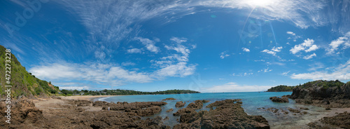 Fototapeta Naklejka Na Ścianę i Meble -  Panorama of stone seashore and blue sea New Zealand