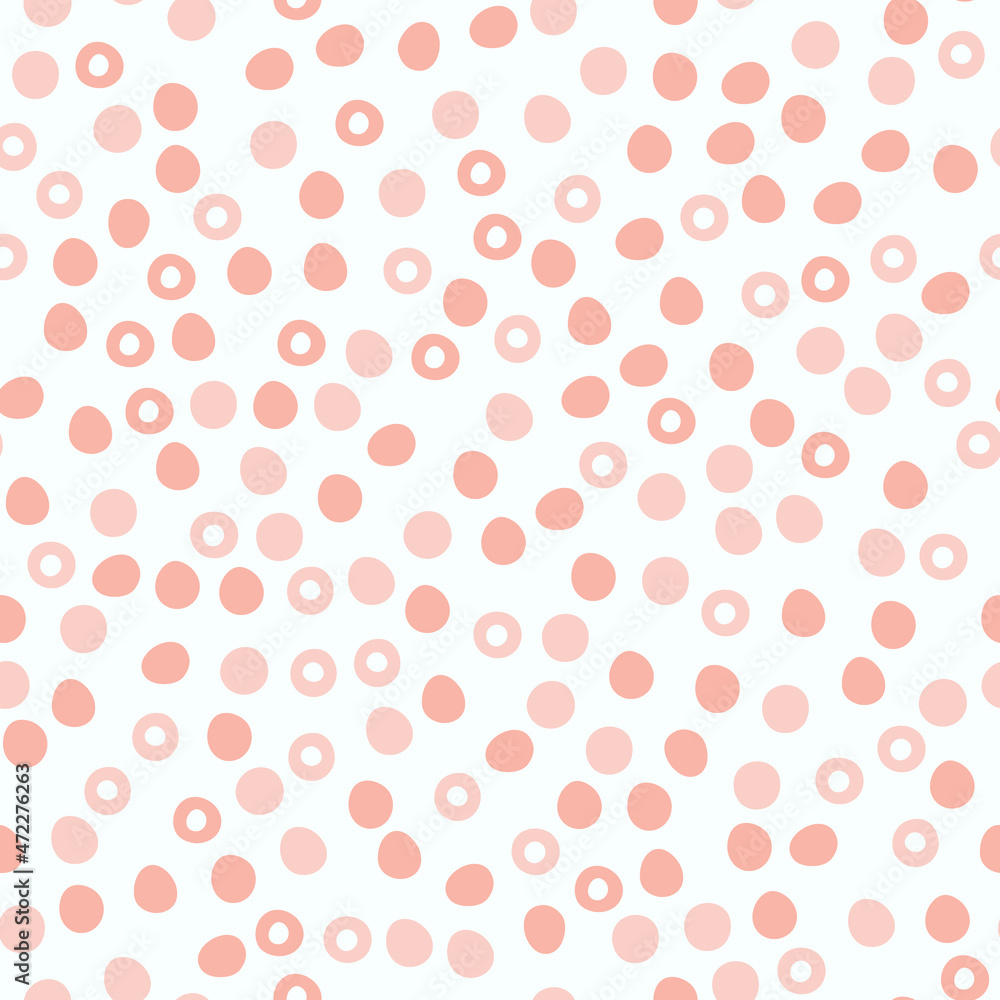Abstract spotted seamless pattern in pastel colors. Pink dotted background. Vector hand-drawn illustration. Perfect for print, decorations, wrapping paper, covers, invitations, cards.