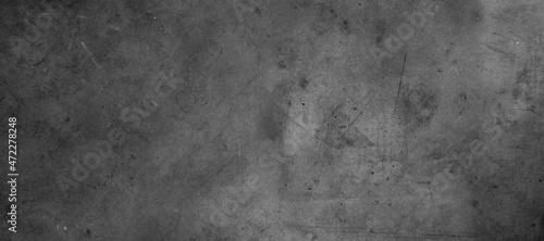 Dark grey textured grunge concrete wall background