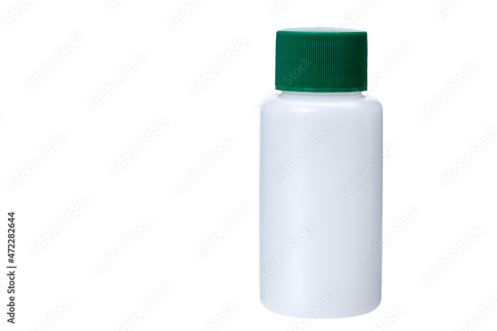 white plastic non transparent bottle with green cap for medical products for healthcare no label object isolated on white background with copy space. white plastic non transparent bottle with green cap for medical products for healthcare no label object isolated on white background with copy space.