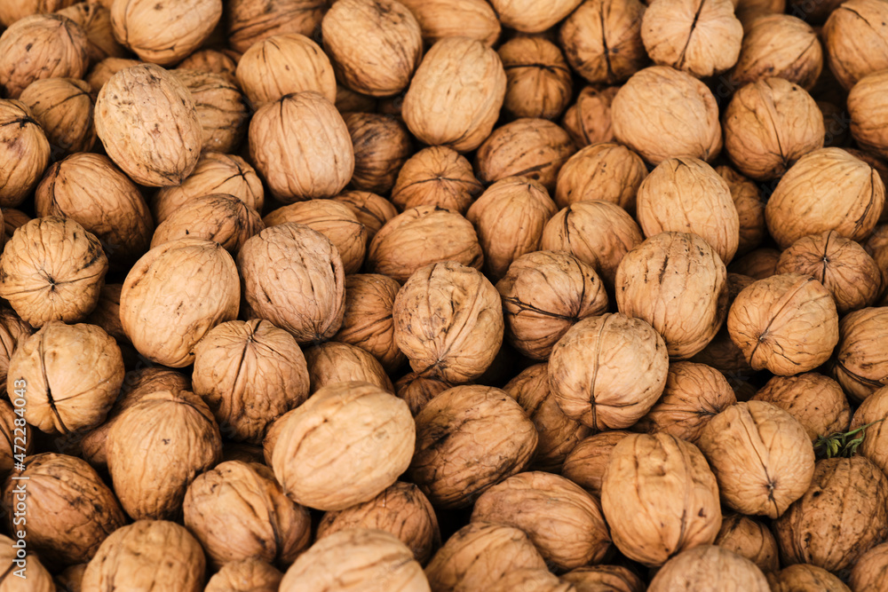 Pile of walnuts at stall Pile of walnuts at stall