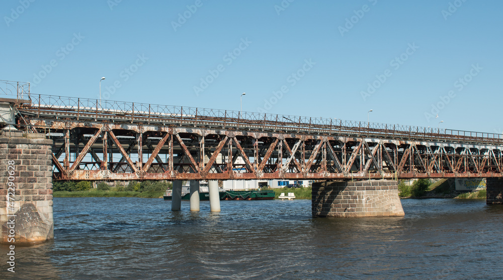 Iron old bridge over the river