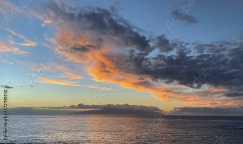 Fototapeta Naklejka Na Ścianę i Meble -  Beautiful sunset over the ocean with dramatic clouds and sky. From the Canary islands in the Atlantic ocean - Spain.