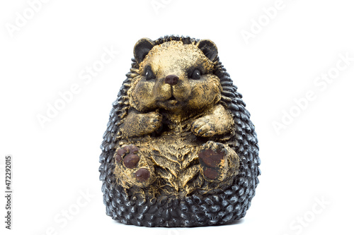 urchin concrete garden sculpture for landscaping and backyard decoration, isolated hedgehog on a white background, nobody. © Александр Беспалый