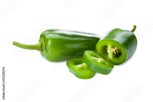 Ripe jalapeno or pepperoni isolated on white background. Closeup view of green chili pepper. Hot spice photo