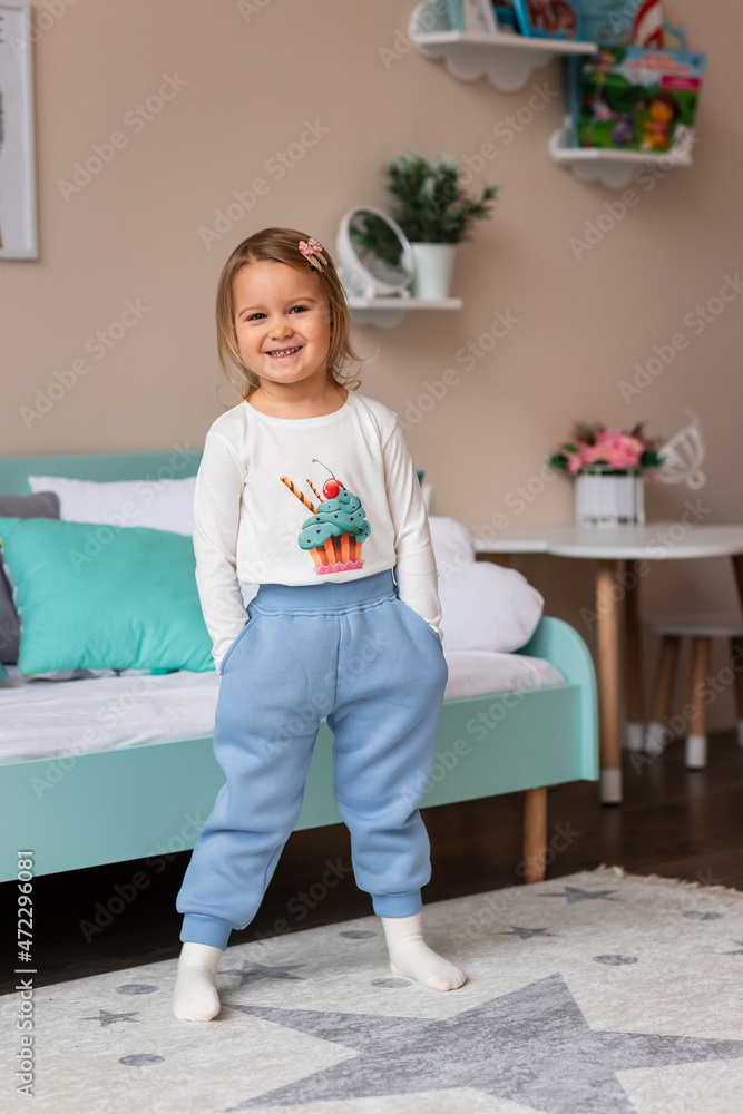 Cute little girl posing in a costume in her room Cute little girl posing in a costume in her room