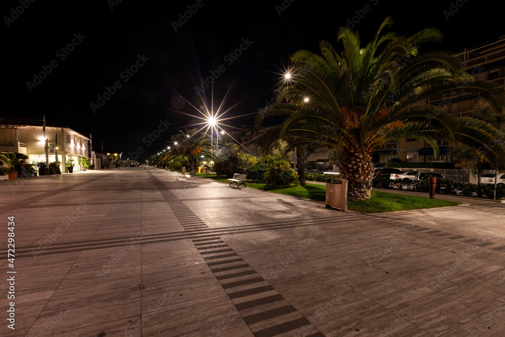 A deserted promenade in Lido di Camaiore, a seaside resort liked by Italians. Tuscany, Italy