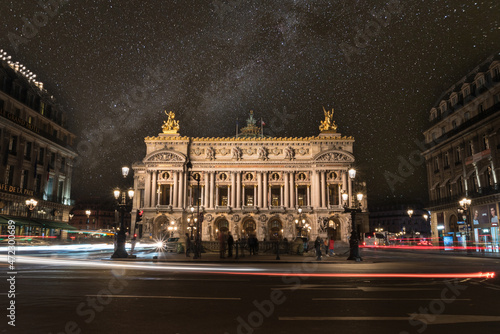 Fototapeta Famous Paris Opera at Night, lights of the traffic leading around
