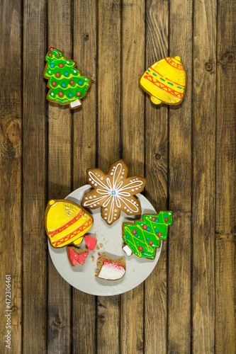 Gingerbread cookies on wooden background. Holiday concept. Christmas time.