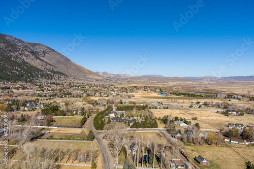 Aerial View of the Genoa Nevada area in Carson Valley with barren trees, farmland and ranches.