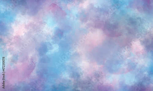 Abstract celestial watercolor background in blue, purple and pink tones. Copy space, horizontal banner.