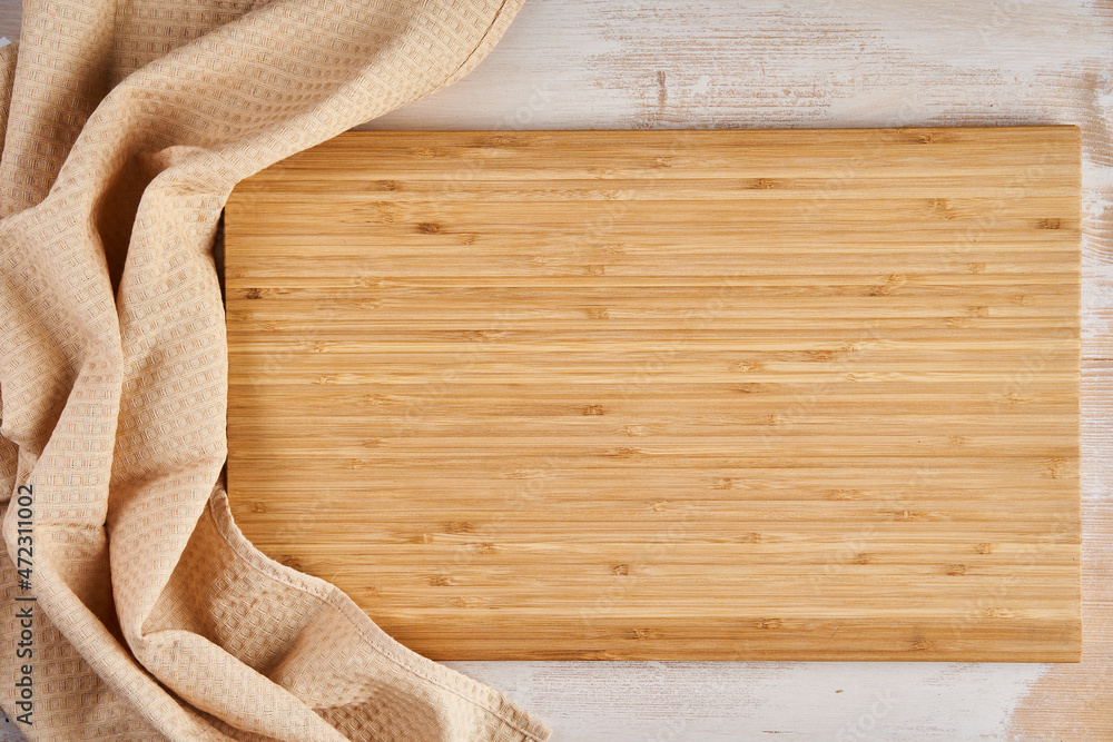Empty bamboo chopping board with copyspace