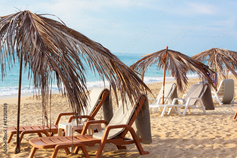 Thailand, Ko Samui. Lounge chairs on a beach. - obrazy, fototapety, plakaty 