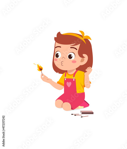 cute little girl holding match stick with fire