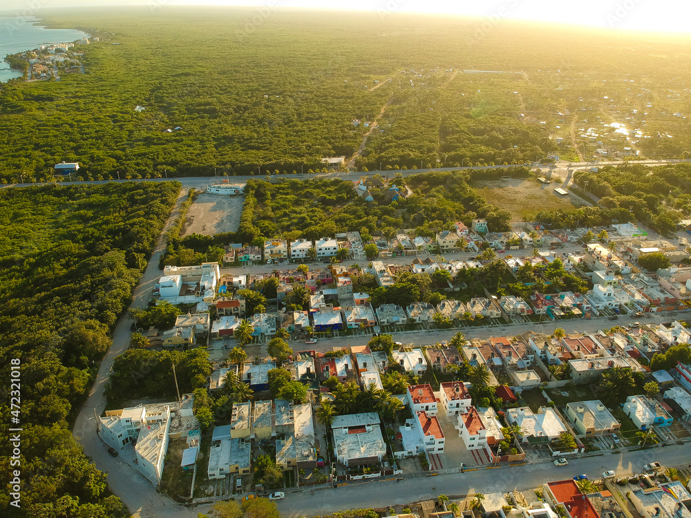 Mahahual Town view from the air in a sunset seen the caribbean colors ...