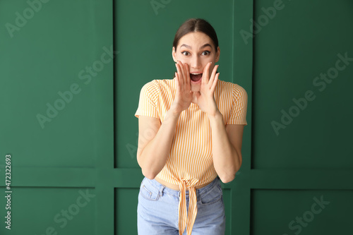 Young gossiping woman on co...