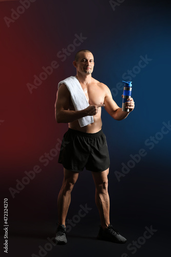 Male bodybuilder with prote...