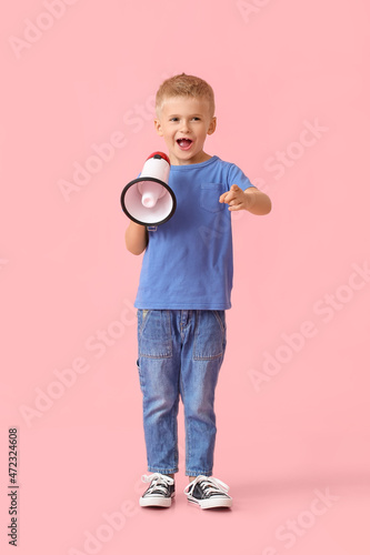 Adorable little boy shoutin...