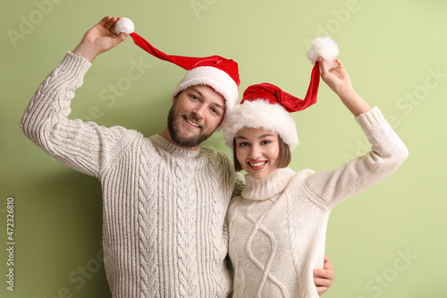 Happy young couple in styli...