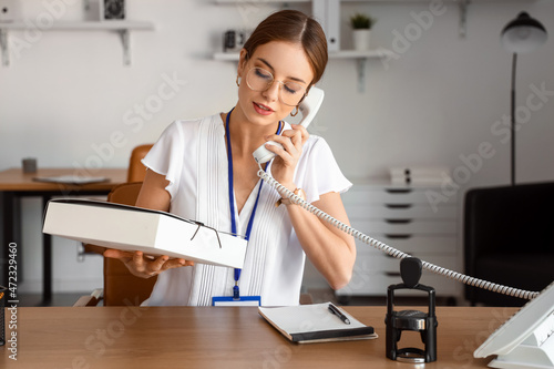 Female notary public talkin...