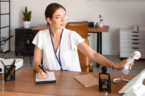 Female notary public workin...
