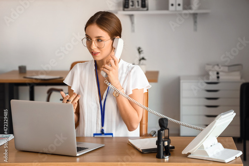 Female notary public talkin...